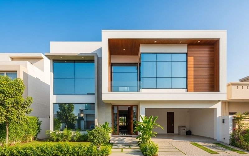 Modern luxury house exterior designed by a Top Residential Architect in Lahore, featuring clean lines, large glass windows, and contemporary elevation.